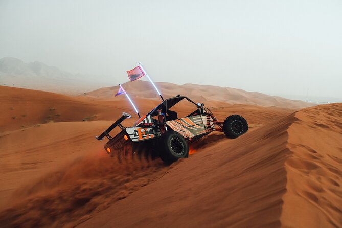 Dubai Desert Fossil Rock Dune Buggy Adventure With Transfers - The Thrilling Dubai Desert Dune Buggy Experience