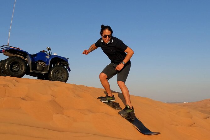 Dubai Desert Safari, Quad Bike Ride, Sandboarding, Camel Ride - Exploring the Desert Dunes on a Thrilling Safari
