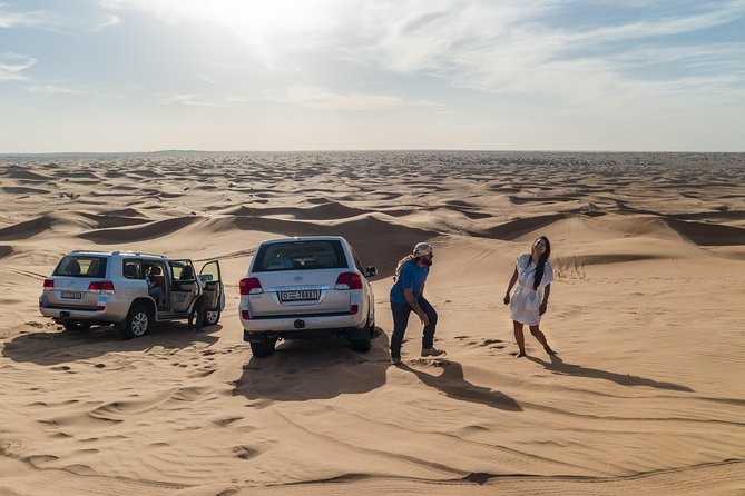 Dubai Red Dune Desert Safari: Camel Ride, Sandboarding & BBQ Options - Unleash Your Adventurous Side: Red Dune Safari