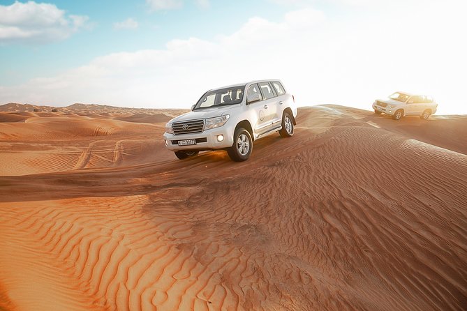 Desert Safari Dubai With Dune Bashing, Sandboarding, Camel Ride, 5 Shows, Dinner - Immerse Yourself in 5 Mesmerizing Shows