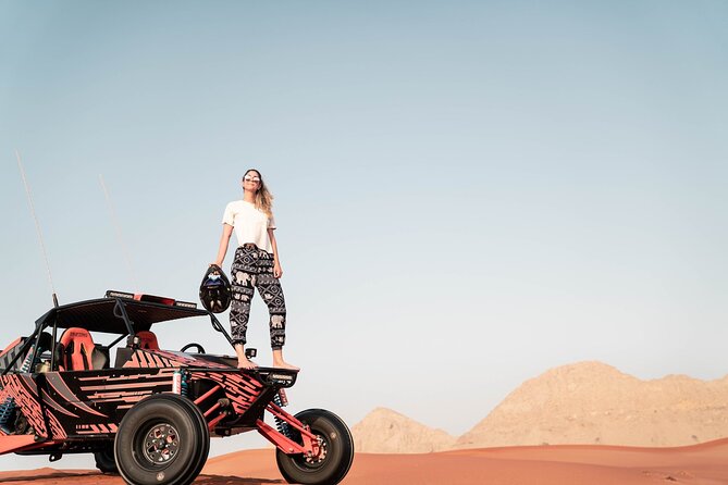 Dubai Desert Fossil Rock Dune Buggy Adventure With Transfers - Sandboarding and Refreshments: Unwind in the Desert
