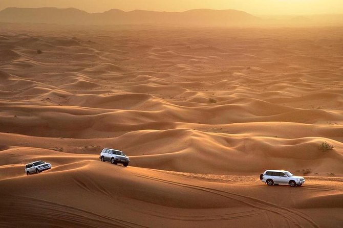 Dubai Desert Safari 4x4 Dune Bashing, Camel Ride, Sand Boarding, BBQ Dinner - Conquer the Sand With Sand Boarding