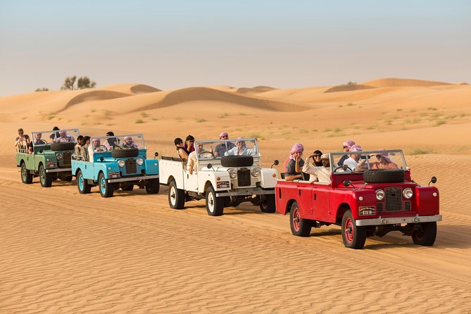 Dubai Heritage Land Rover Desert Safari With Traditional Dinner & Entertainment - Bedouin-Style Camp Experience With Delicious Dinner and Live Entertainment